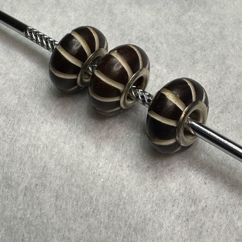 5/$20 single carved Charm Bead